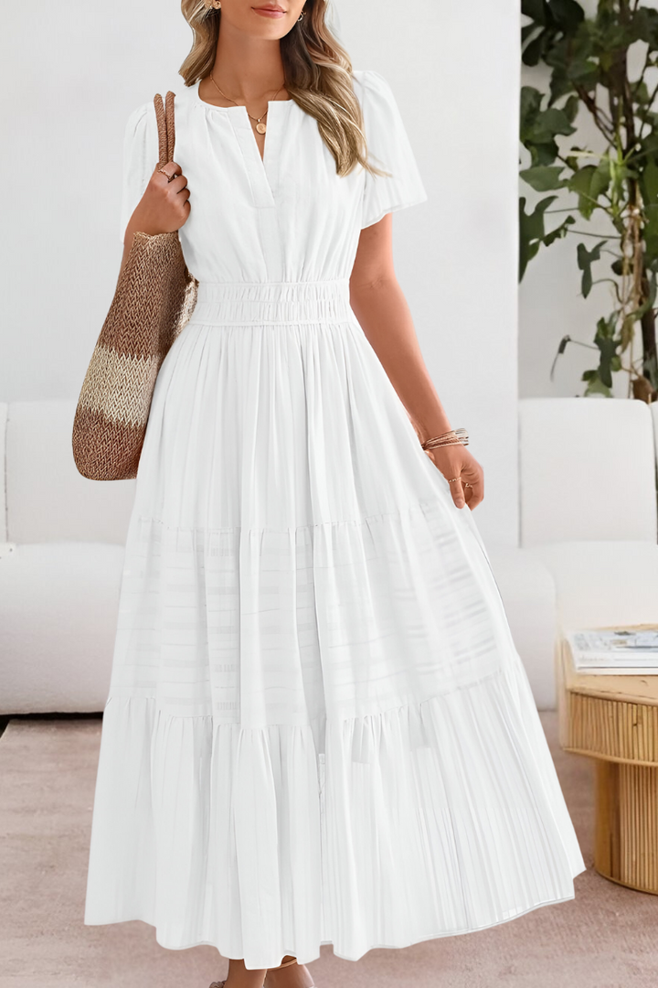 THESSALY – BREEZY BOHO DRESS WITH FLOWY CHARM